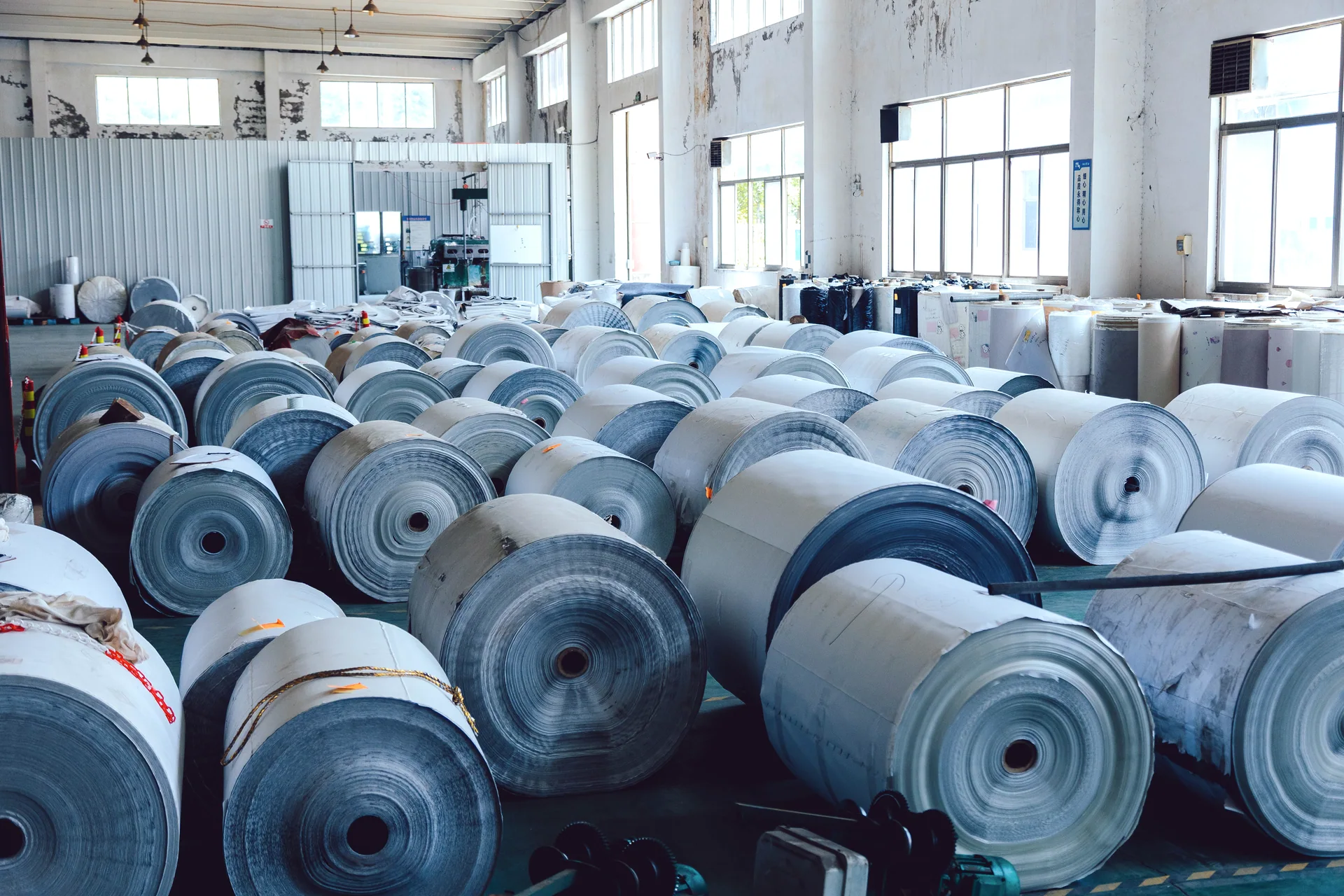 PVC flooring material rolls in the workshop